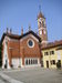 Kostel Panny Marie Pomocnice postavený při příležitosti výročí 100 let od narození Dona Boska naproti jeho domečku. 