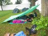Spali jsme pod plachtou a pořádně jsme zmokli. /We slept under the shelter and got wet a lot.